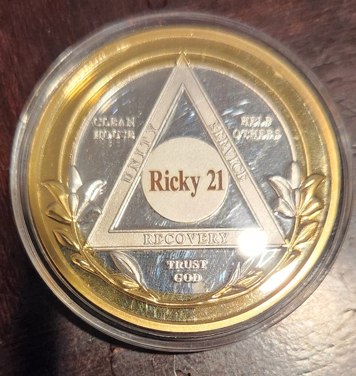 Customer-submitted review photo of a Victory Path sobriety medallion.